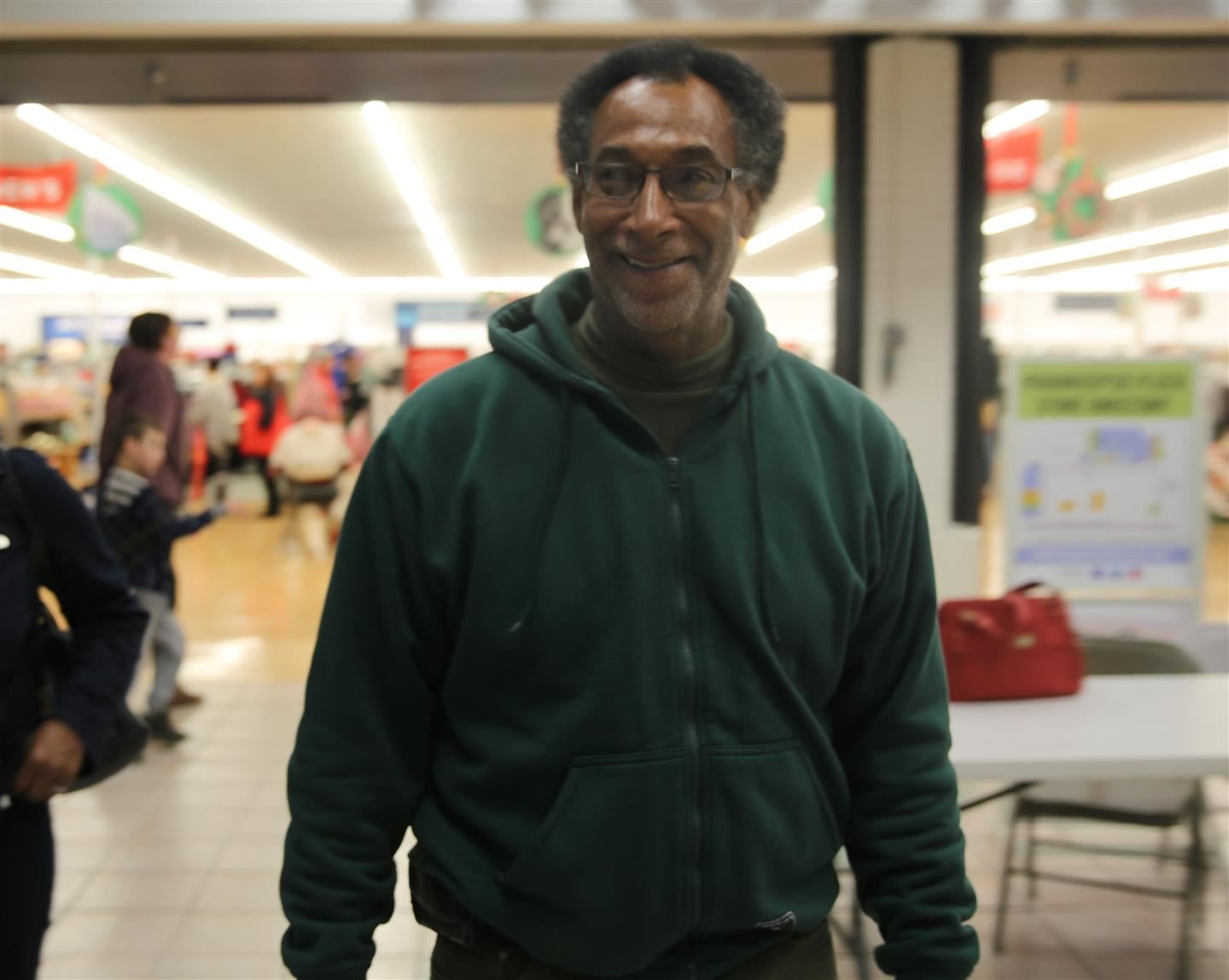  David "Roy" Tinsley stands smiling in a store